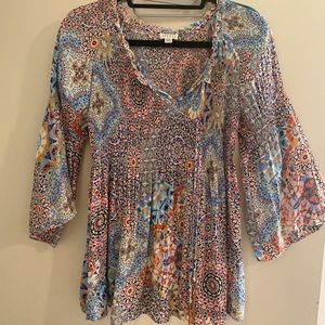 Multicolored ruched blouse with gold tassels